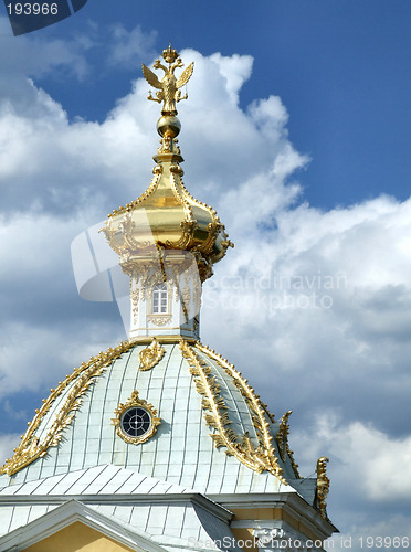 Image of Golden dome with a sculpture