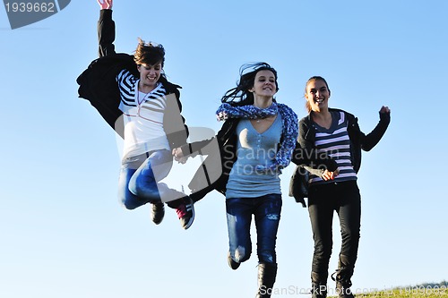Image of group of teens have fun outdoor