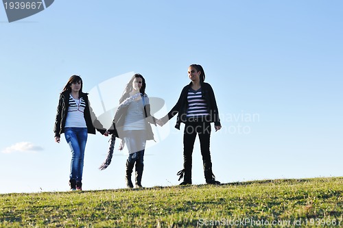 Image of group of teens have fun outdoor