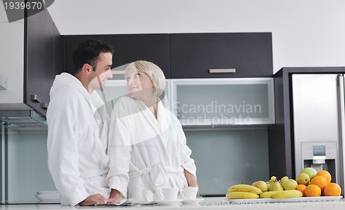 Image of young couple have fun in modern kitchen