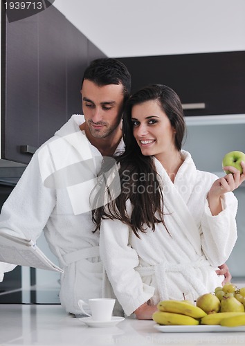 Image of young couple have fun in modern kitchen