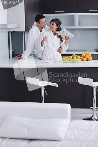 Image of young couple have fun in modern kitchen