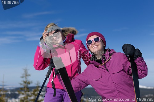 Image of winter season fun with group of girls
