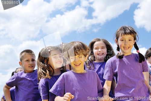 Image of happy kids group  have fun in nature