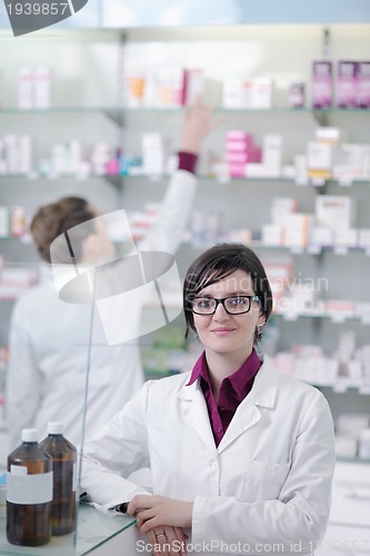 Image of team of pharmacist chemist woman  in pharmacy drugstore