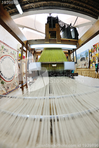 Image of traditional arabic rug production