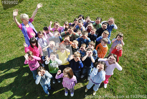 Image of preschool  kids outdoor have fun