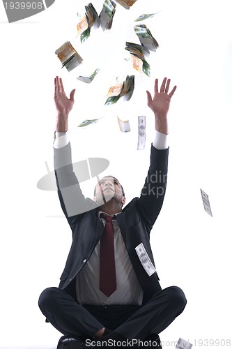 Image of Business man holding money