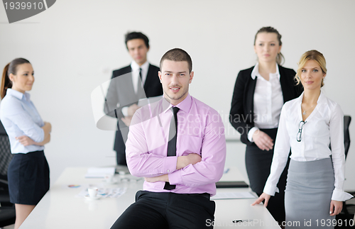 Image of young business man at meeting