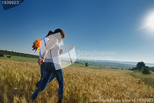 Image of happy couple in wheat field