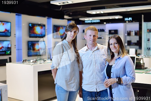 Image of people buy  in consumer electronics store