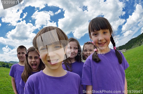 Image of happy kids group  have fun in nature
