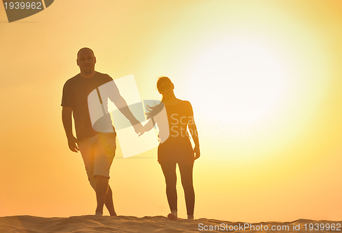 Image of couple enjoying the sunset