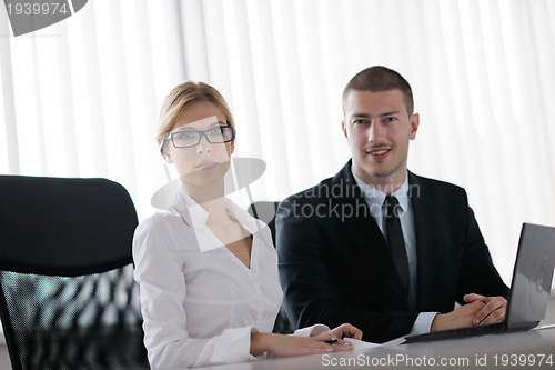 Image of business people in a meeting at office