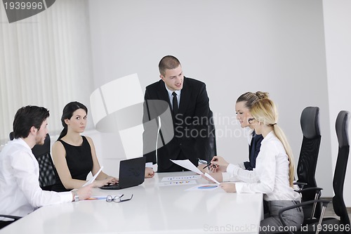 Image of business people in a meeting at office