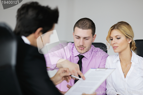 Image of Group of young business people at meeting