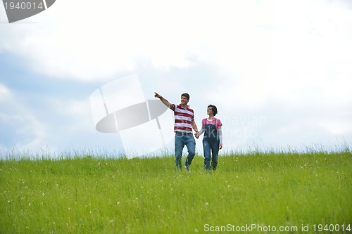 Image of romantic young couple in love together outdoor