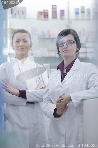 Image of team of pharmacist chemist woman  in pharmacy drugstore