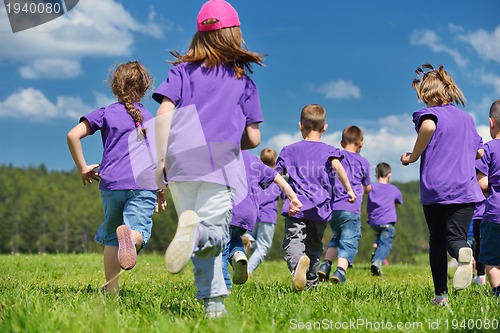 Image of happy kids group  have fun in nature