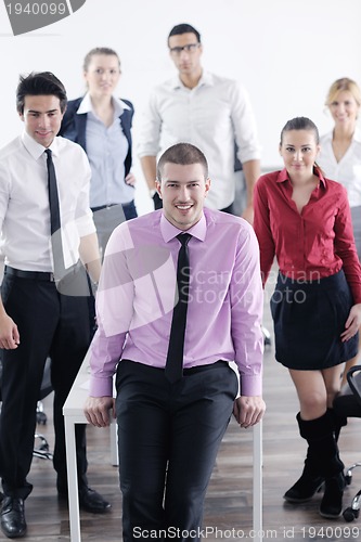 Image of young business man at meeting