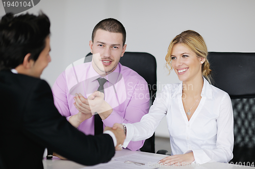 Image of Group of young business people at meeting