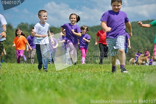 Image of happy kids group  have fun in nature