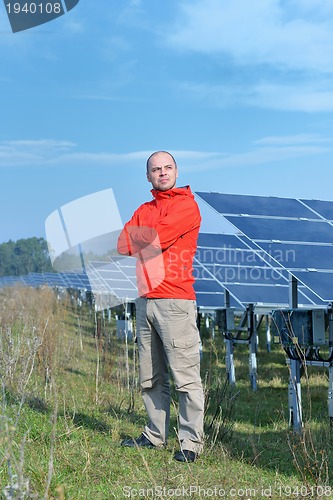 Image of Male solar panel engineer at work place