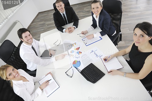Image of business people in a meeting at office