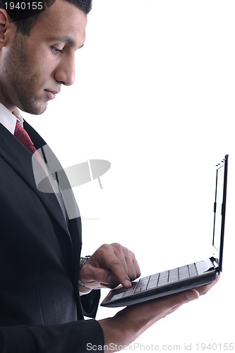 Image of business man work on mini laptop