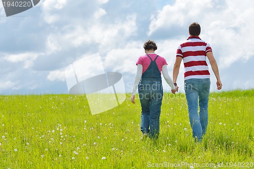 Image of romantic young couple in love together outdoor