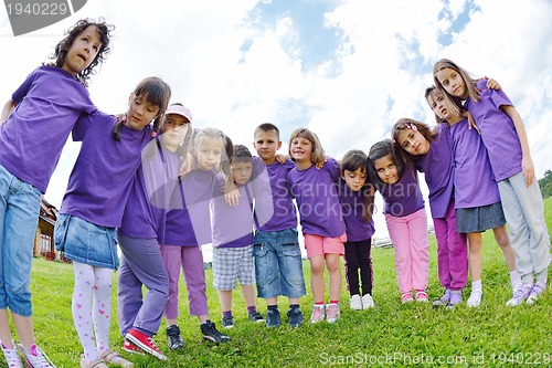 Image of happy kids group  have fun in nature