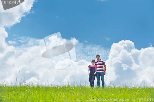 Image of romantic young couple in love together outdoor