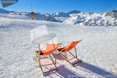 Image of wooden chair on top of mountaint