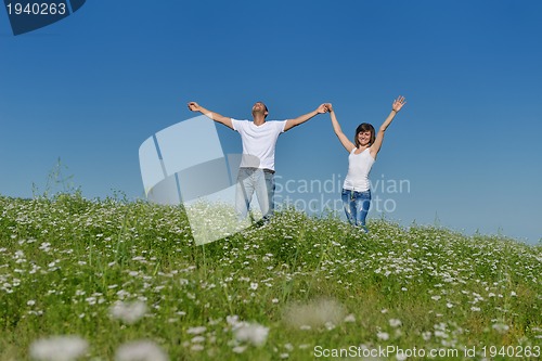 Image of happy couple in wheat field