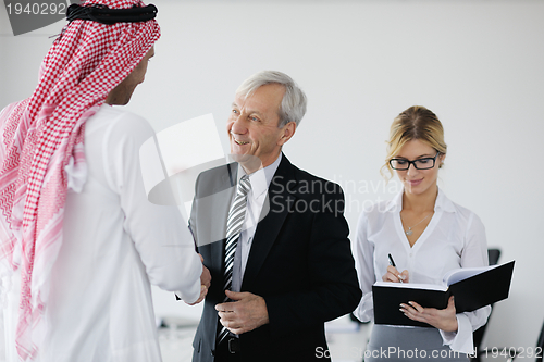 Image of Arabic business man at meeting