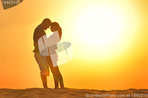 Image of couple enjoying the sunset