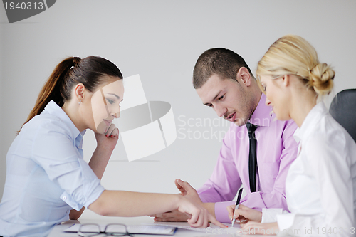 Image of Group of young business people at meeting