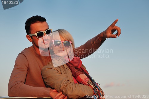 Image of couple in love  have romantic time on boat