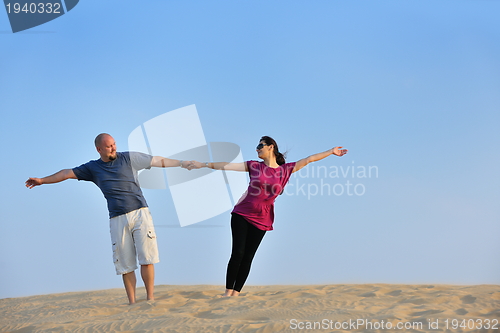 Image of couple enjoying the sunset