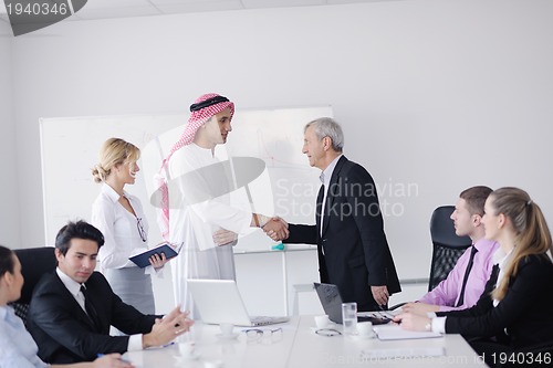 Image of Arabic business man at meeting