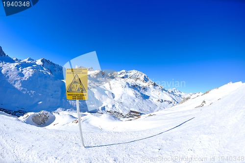 Image of Sign board at High mountains under snow in the winter