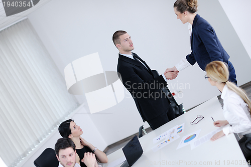 Image of business people in a meeting at office