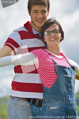 Image of romantic young couple in love together outdoor