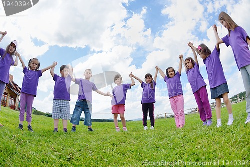 Image of happy kids group  have fun in nature