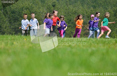 Image of happy kids group  have fun in nature