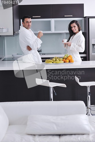 Image of young couple have fun in modern kitchen