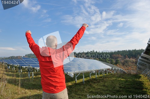 Image of Male solar panel engineer at work place