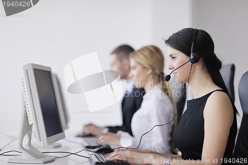 Image of business people group working in customer and help desk office