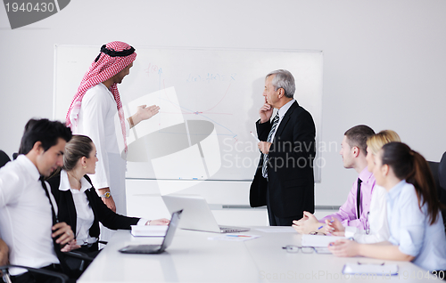 Image of Arabic business man at meeting