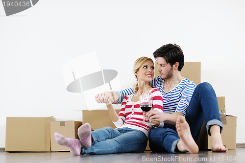 Image of Young couple moving in new house